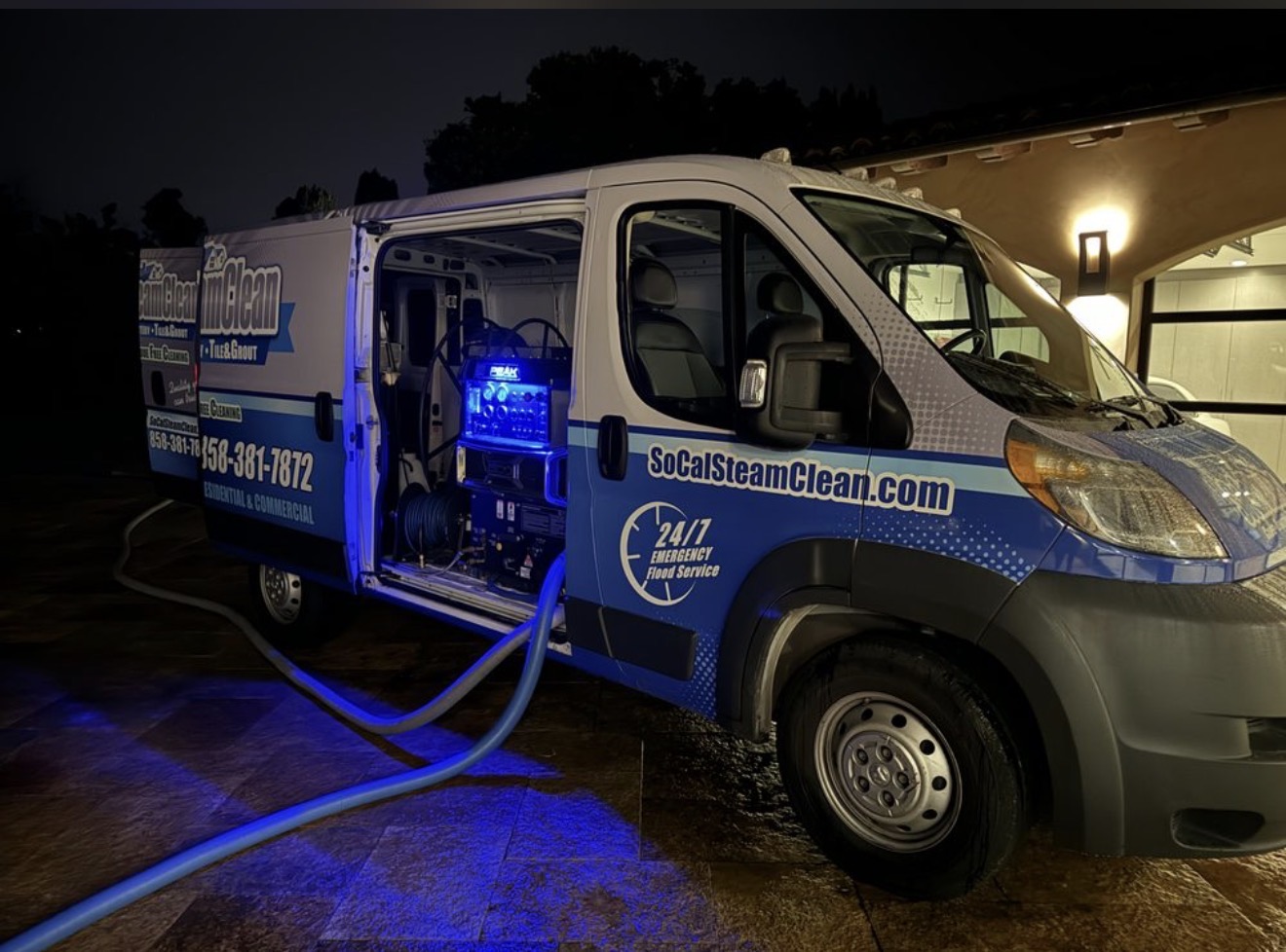 Our fleet in San Diego County — SoCal Steam Clean SoCal Steam Clean service van at night with truck-mounted carpet cleaning equipment in San Diego County