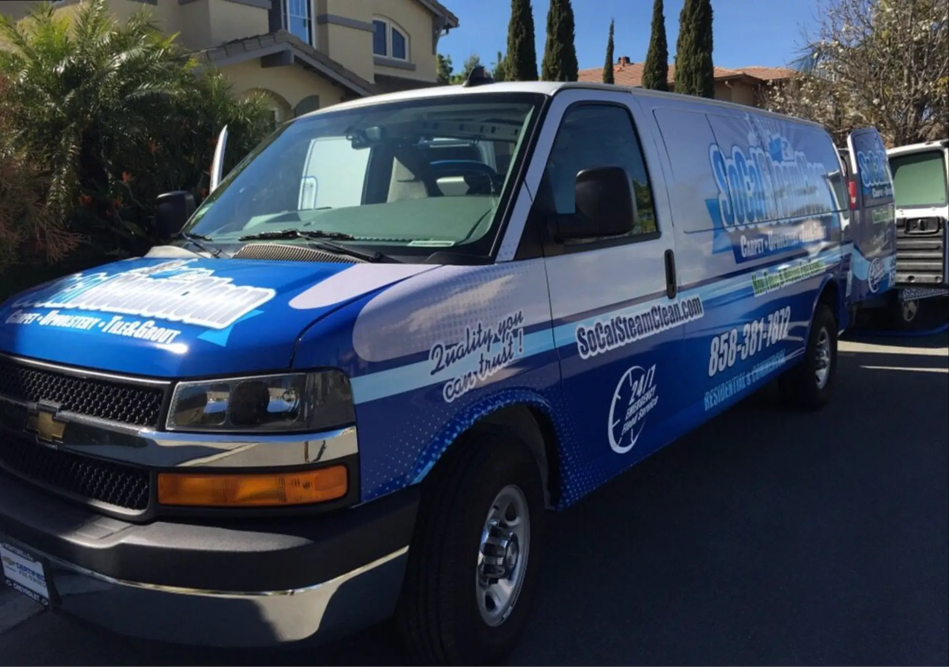 Our fleet in San Diego County — SoCal Steam Clean SoCal Steam Clean truck-mounted carpet cleaning van parked in a San Diego neighborhood driveway